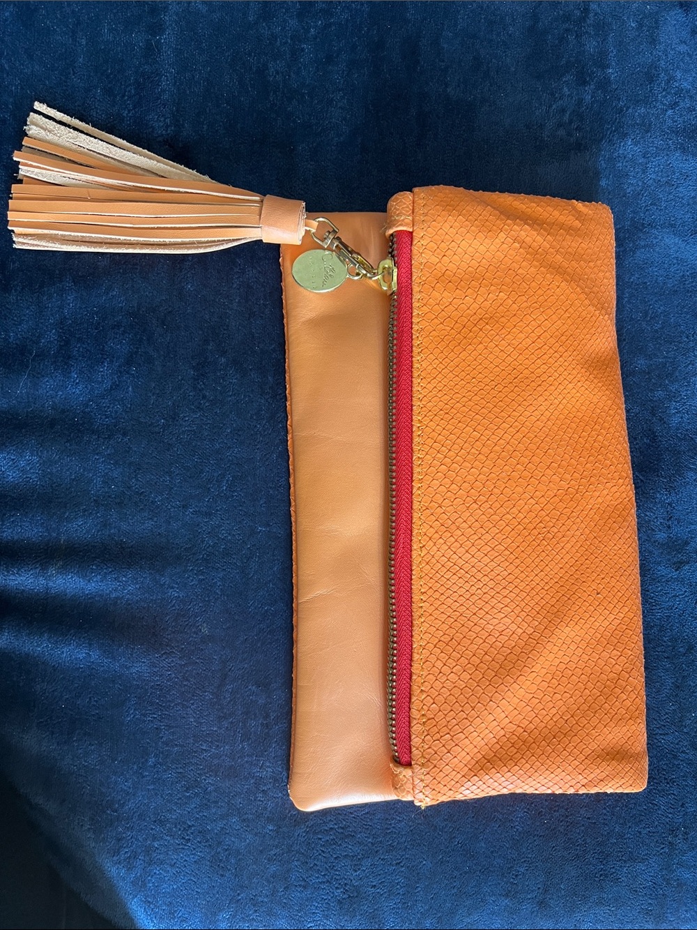 Two-Tone Orange Wristlet Clutch with Tassel Accent